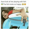 thumb_aww-look-at-her-playing-with-fish-the-fish-looks-2807687.png
