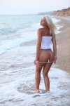 637771253_blonde-goddess-gertruda-dips-her-sexy-body-in-the-sea-03.jpg